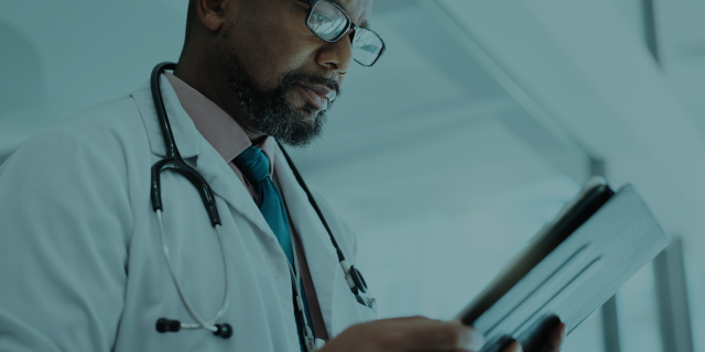 Doctor examining a medical chart