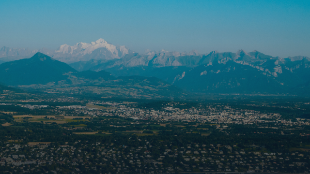 view of geneva from a plane with mountains in distance