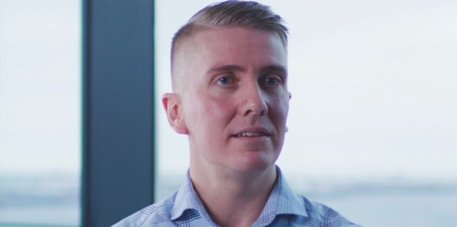 Oli headshot, a blonde white man