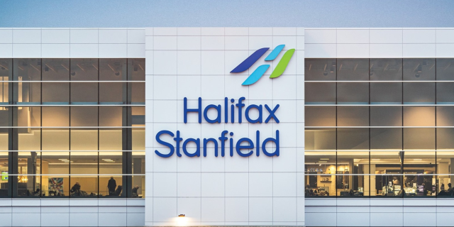 a photo of the Halifax airport with a sign on the building that says "Halifax Stanfield"