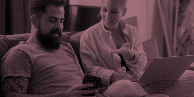 workflow demo image, man and woman discussing something over a laptop