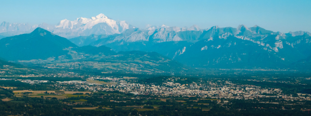 view of geneva from a plane with mountains in distance