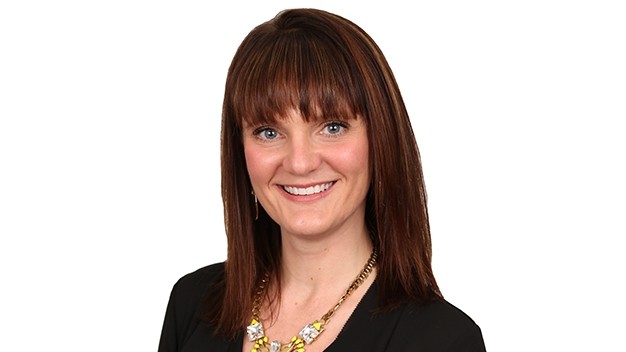 portrait of Sandy Steiger in front of white background