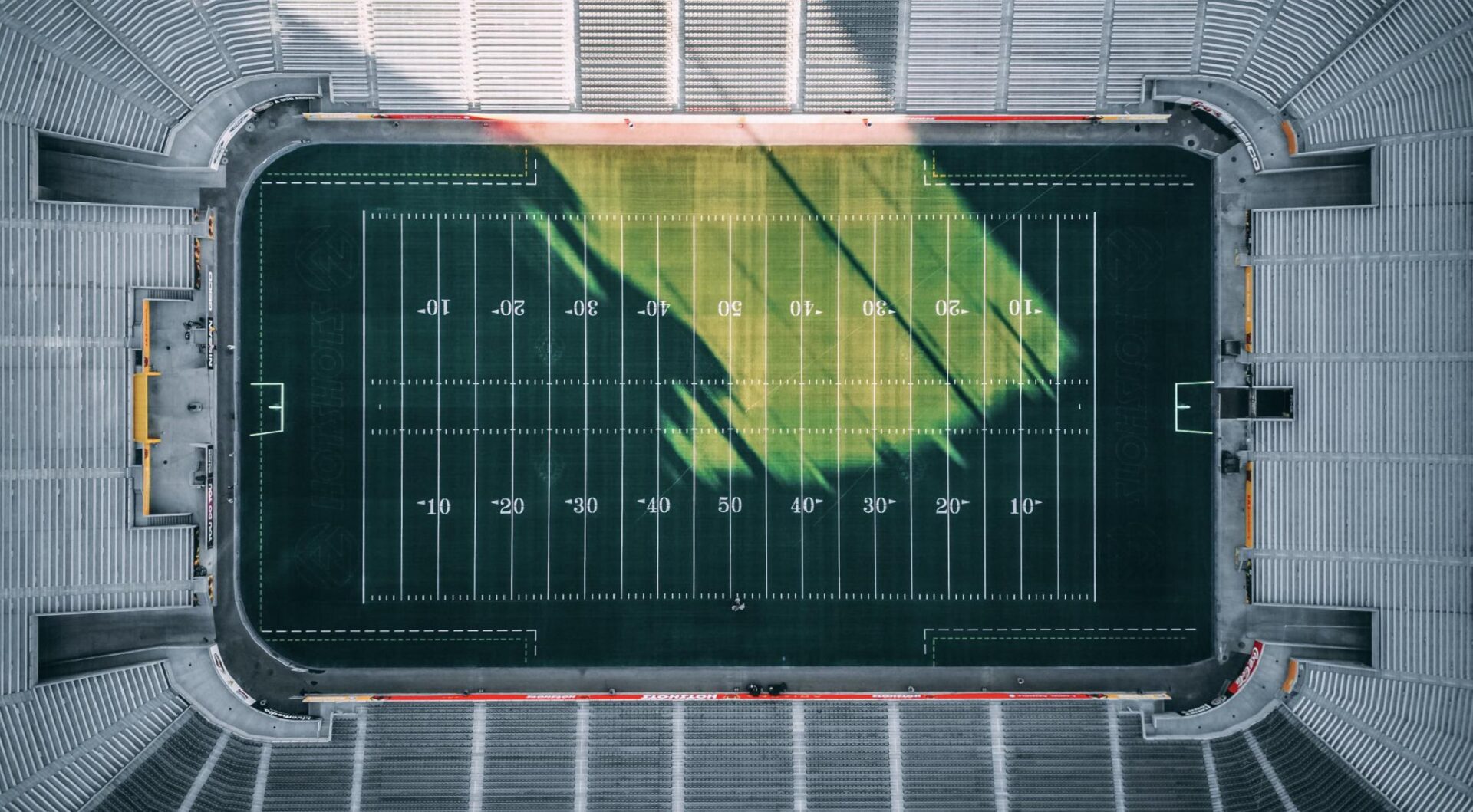 An overhead shot of an empty football stadium