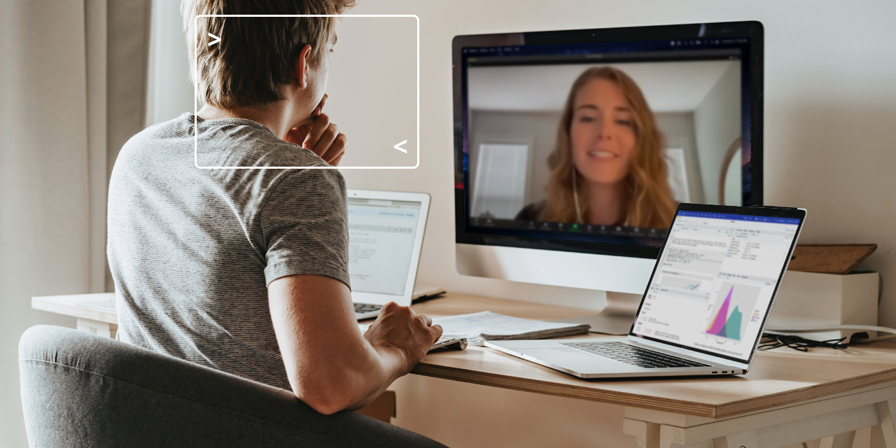 A person with 2 laptops and a desktop computer is watching a Data Science Hangout