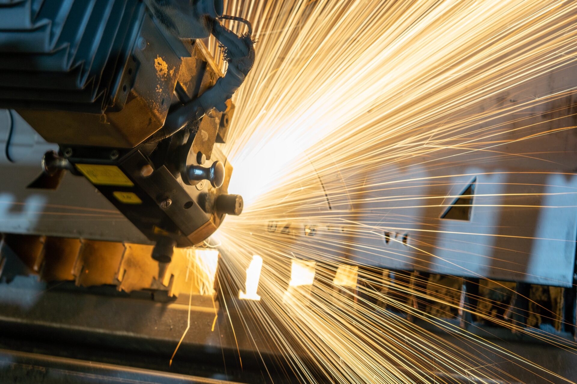 Sparks flying out of manufacturing machine