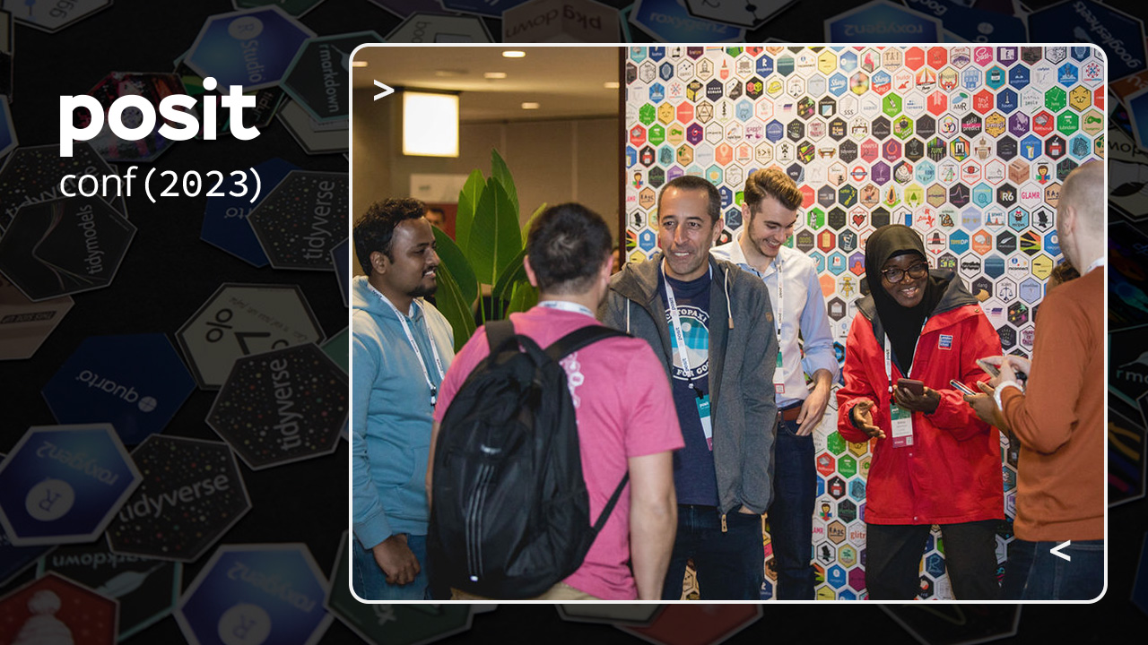 A group of posit::conf attendees in front of the hex wall, smiling and laughing. The text says posit conf 2023.